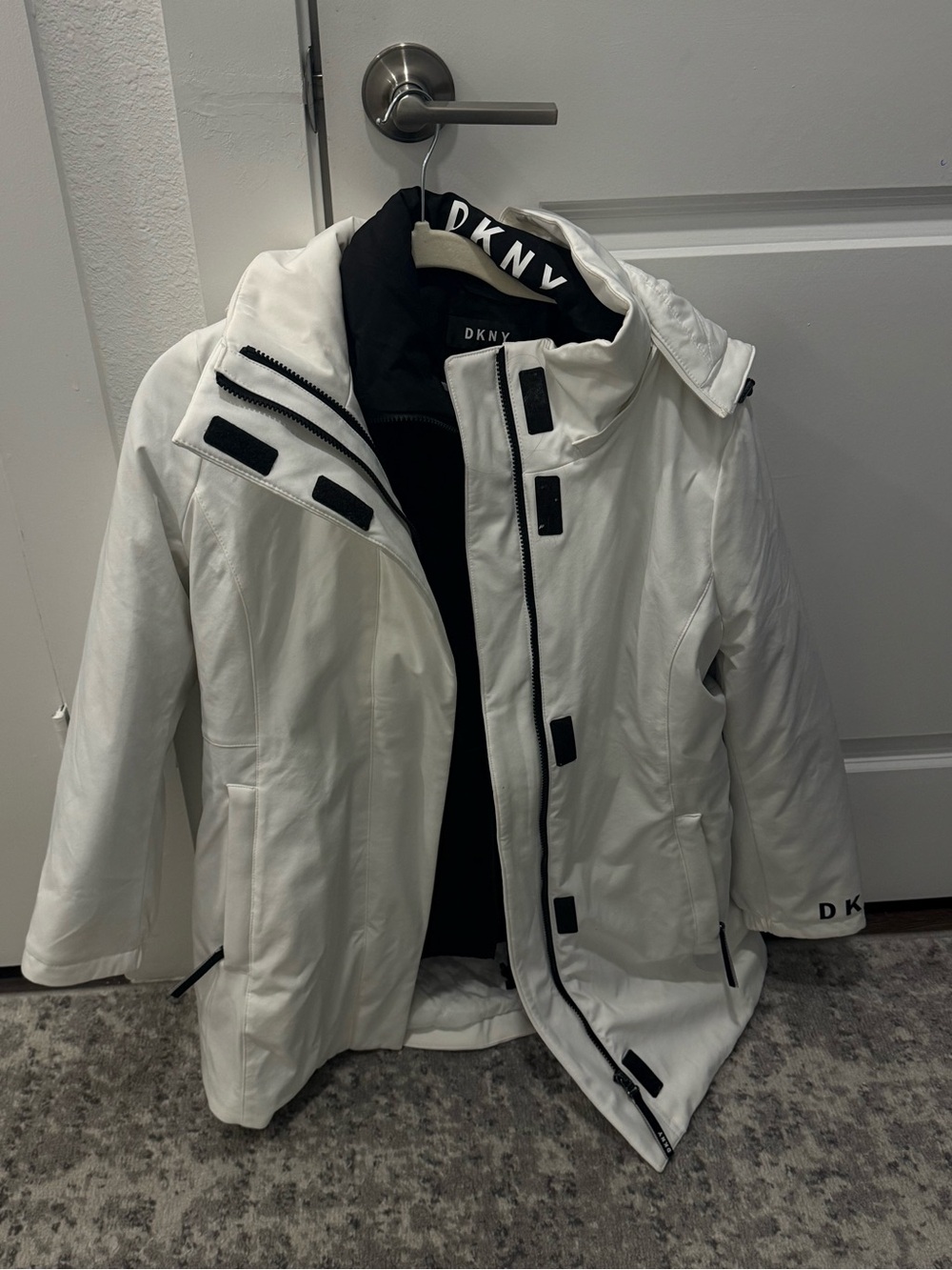 DKNY White Women’s Ski Jacket with Black Trim (never worn)